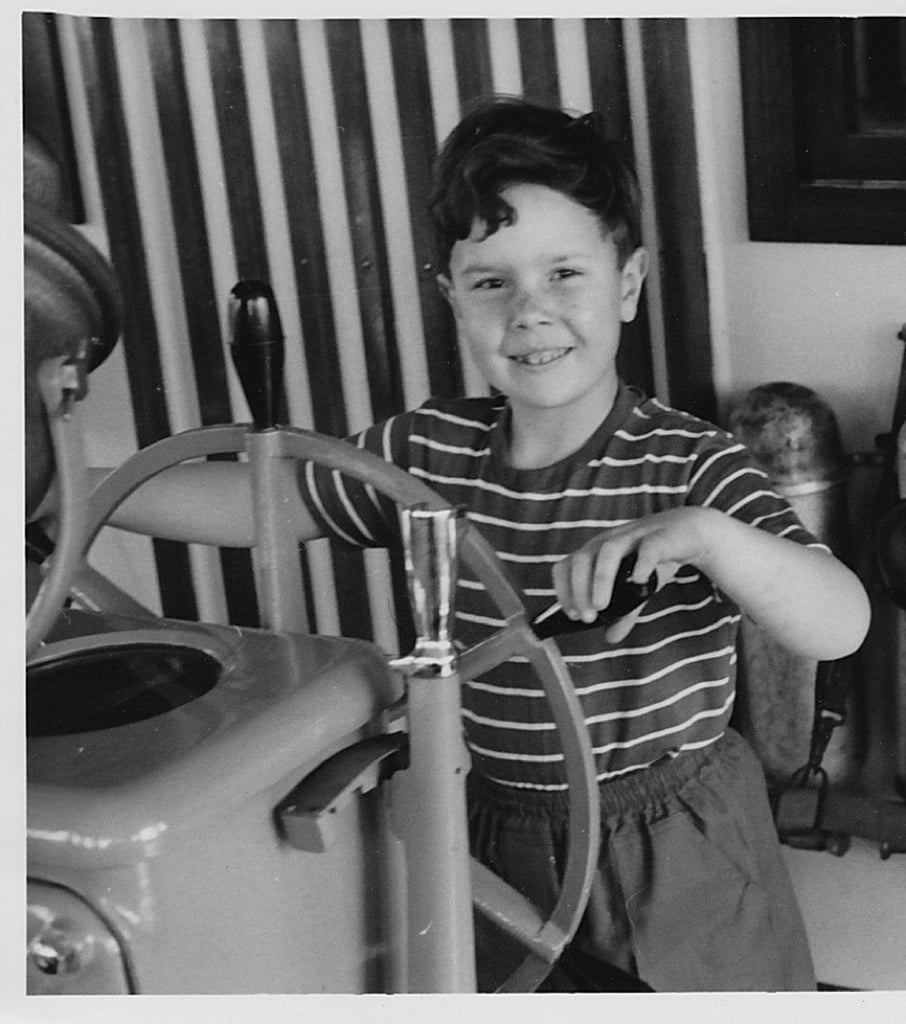 Phil in his youth at the wheel of the Bencomo